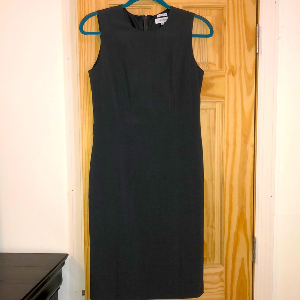 Grey dress. Missing belt.